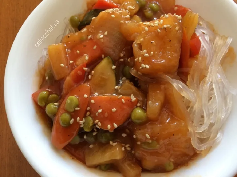 close up of gluten-free sweet and sour sauce with vegetables and tofu on harusame noodles